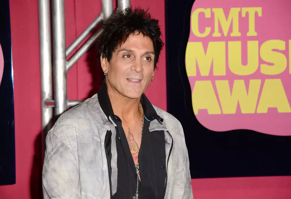 Journey Drummer Held On Rape Charge